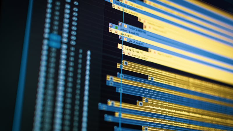 Software team managing a release pipeline on their screens