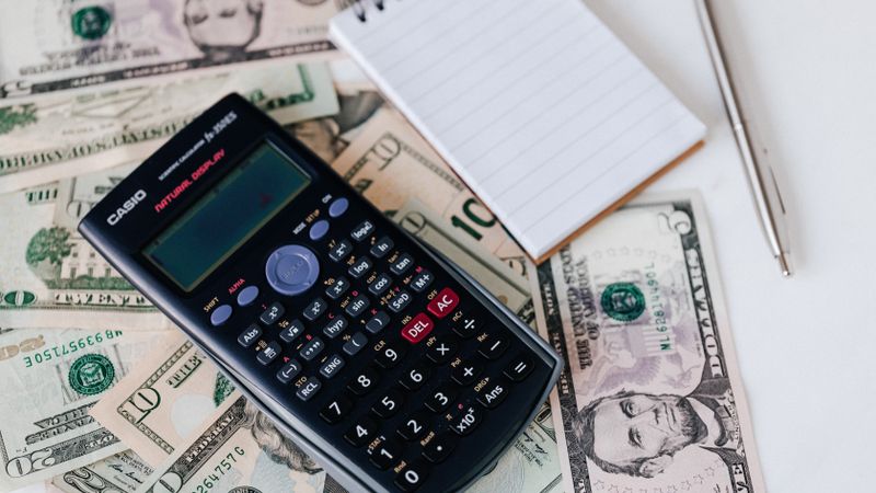 Calculator and budget documents for estimating project costs