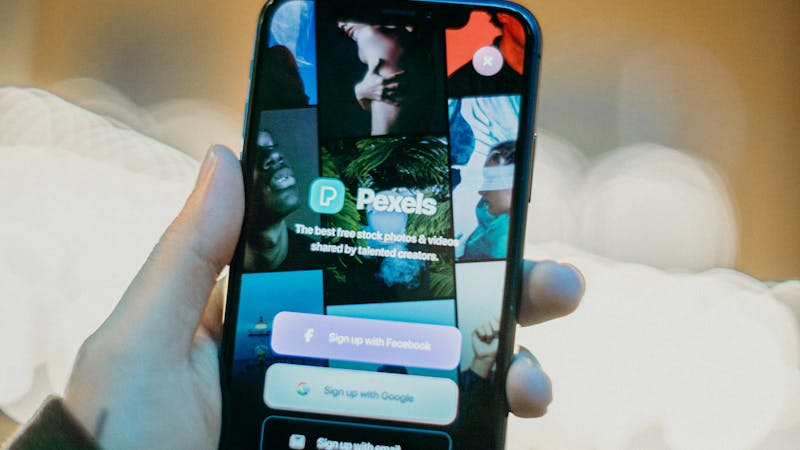 Person interacting with a mobile app on their smartphone