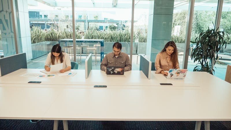 A technology team collaborating in a modern office in the Philippines