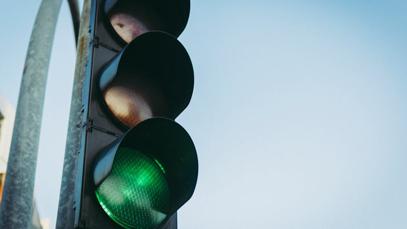 Green traffic light signaling it is time to go and launch