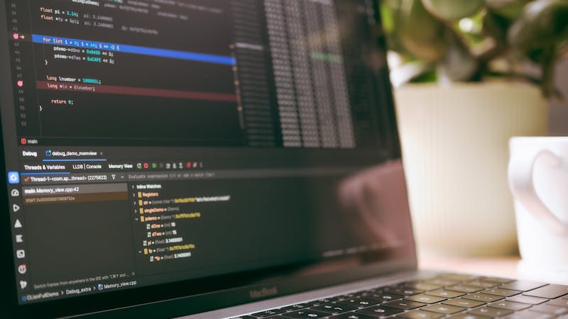 Software development tools and frameworks displayed on a modern workspace