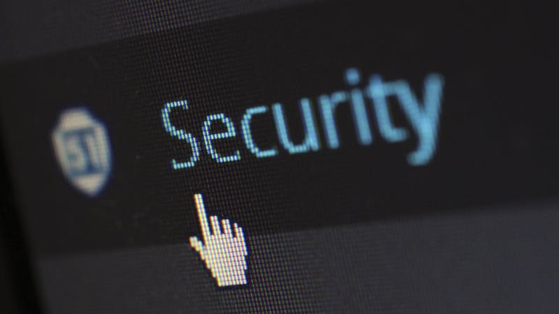 Data privacy protection shield icon on a digital screen